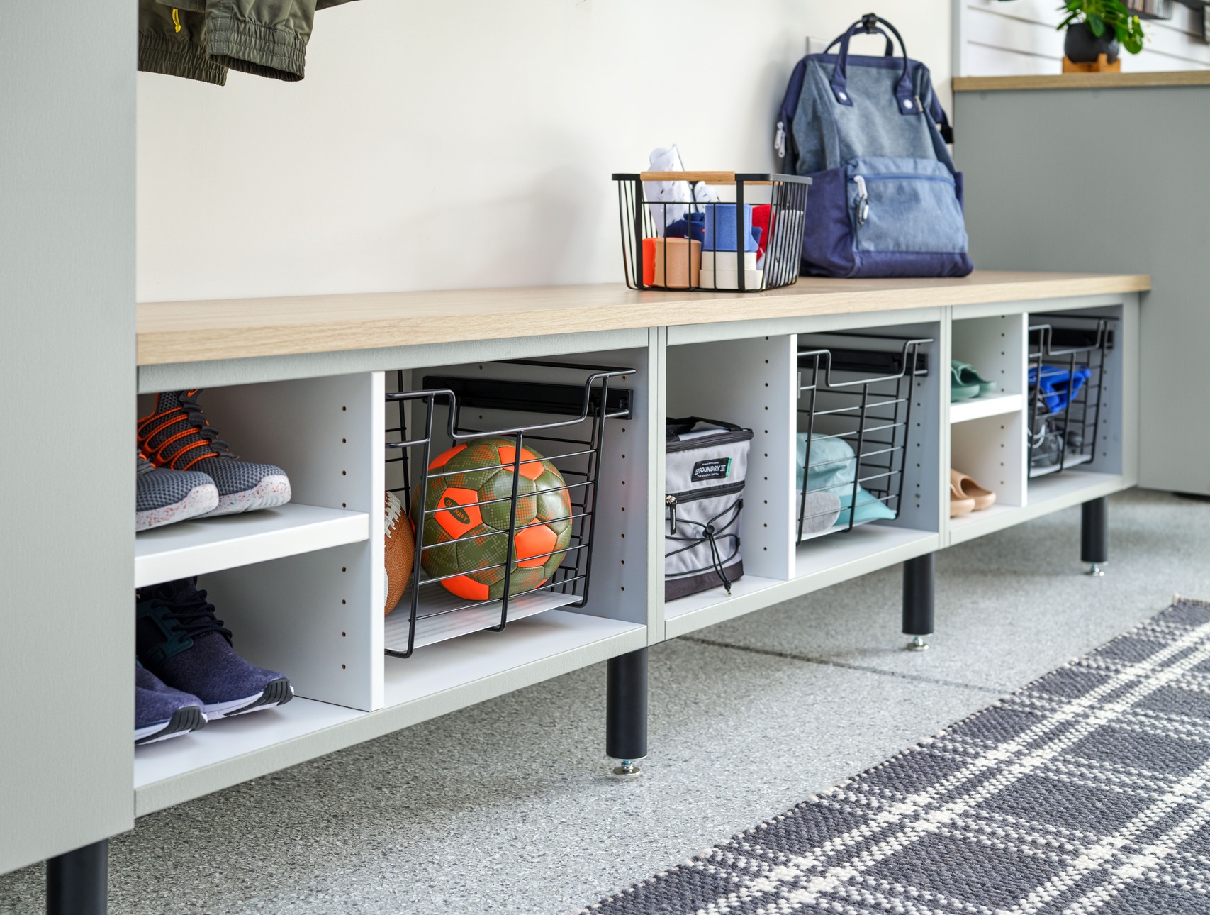 Overhead ceiling storage rack installation for garage organization