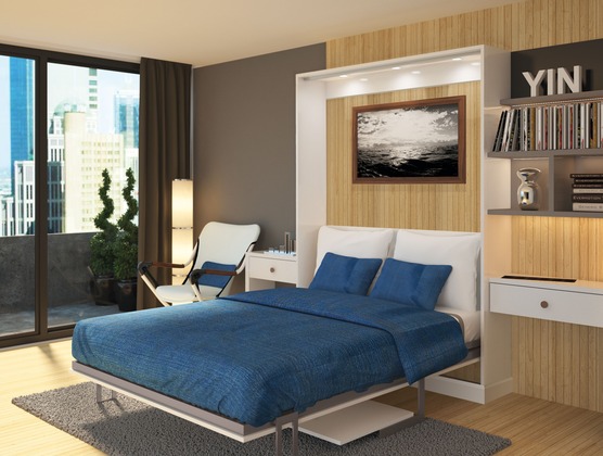 Murphy bed with integrated shelving and desk — space-saving guest room solution