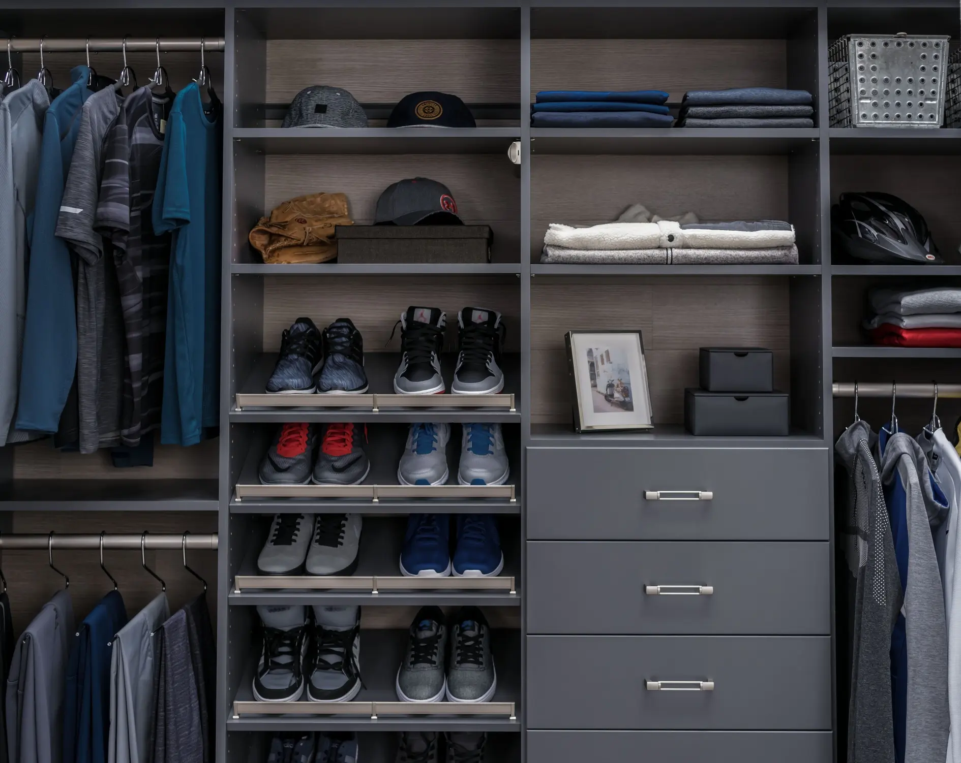 Luxury walk-in closet with built-in shelving and LED lighting