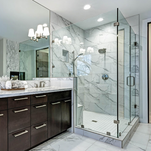 Frameless glass shower enclosure with premium hardware